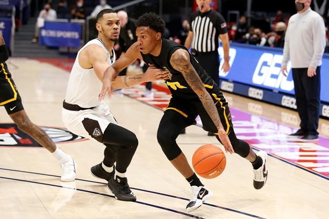 Positive virus tests bounce VCU from NCAAs; Oregon advances | iNFOnews.ca