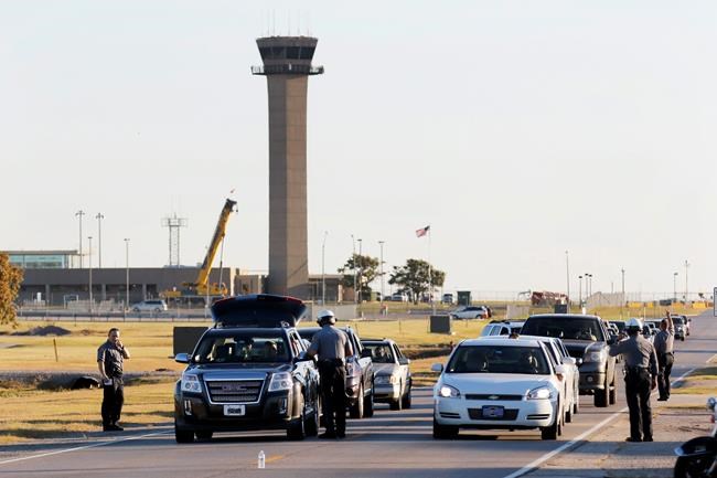 The Latest: Airport resumes operations after shooting | iNFOnews.ca CP771628347