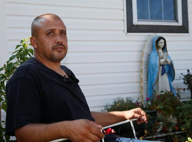 The Latest: Neighbor says man shot by cop didn't speak | iNFOnews.ca