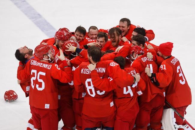 Russian men win hockey; Bjoergen, Norway get gold again | iNFOnews.ca