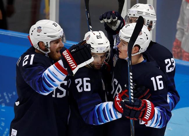Canadians earn Olympic gold in ice dancing, US hockey wins | iNFOnews.ca Canadians earn Olympic gold in ice dancing, US hockey wins | iNFOnews.ca