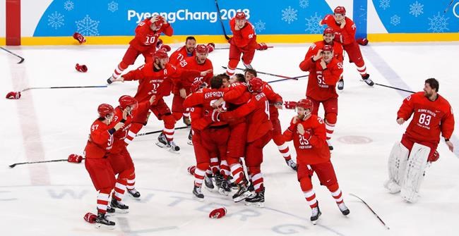 Russians win hockey gold with 4-3 OT win over Germany | iNFOnews.ca CP684875985