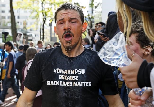 Activists clash with Portland police as council OKs contract | iNFOnews.ca