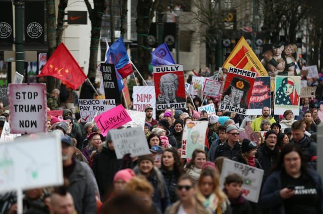 Thousands march for women in London despite sleet and snow | iNFOnews.ca