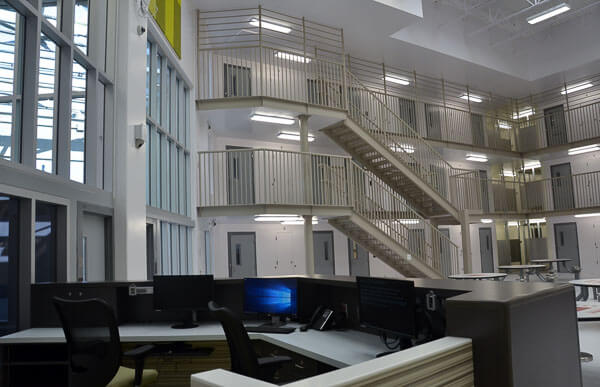 The inside of a jail showing the foyer outside of the cells.