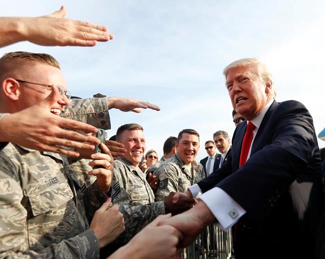The Latest: Trump attacks news media on night of dinner | iNFOnews.ca CP1980399049