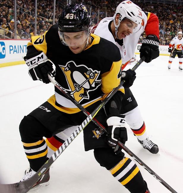 Schultz's OT goal lifts Penguins past Flames 4-3 | iNFOnews.ca