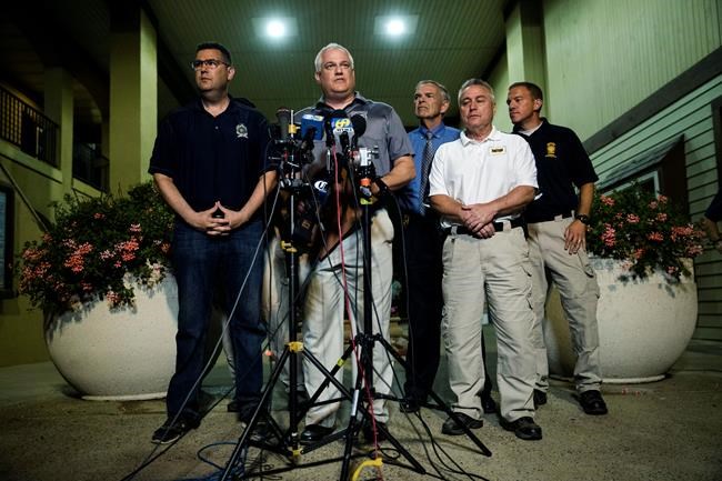 The Latest: Human remains found in search for 4 missing men | iNFOnews.ca