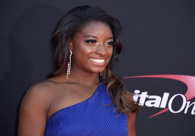 Simone Biles shares goofy video after wisdom teeth surgery | iNFOnews.ca CP1586971585
