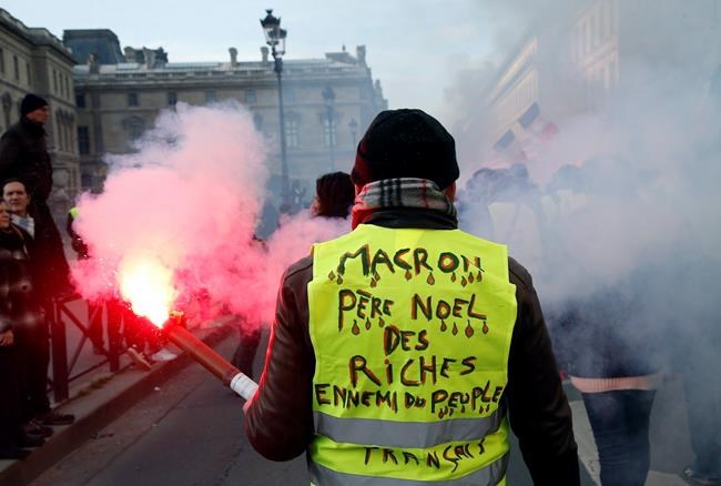 France's yellow vest protesters join union march, a first. | iNFOnews.ca