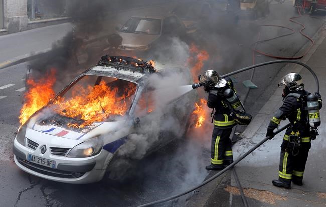 French police protest 'anti-cop' violence, police car burned | iNFOnews.ca