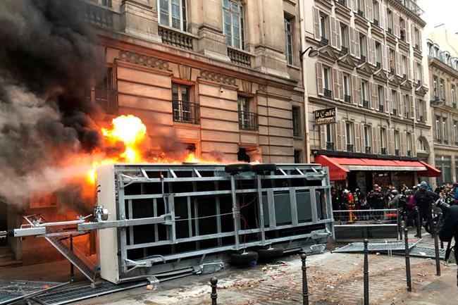 The Latest: French protesters set fires amid strikes | iNFOnews.ca The Latest: French protesters set fires amid strikes | iNFOnews.ca