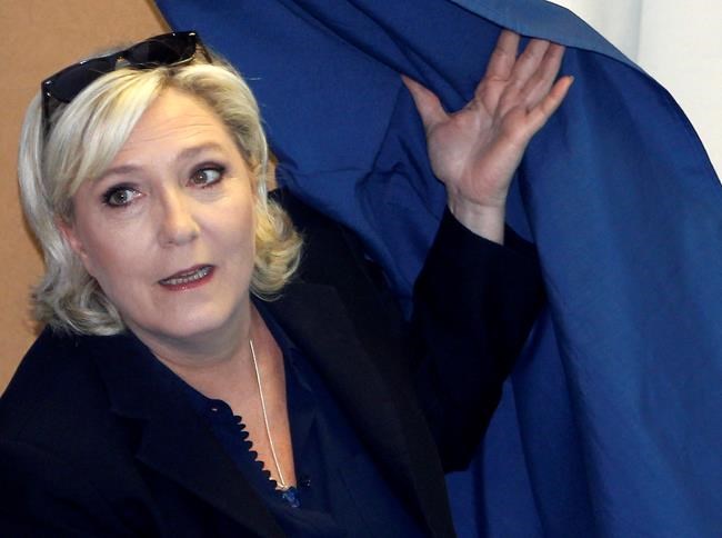 French far-right leader Marine Le Pen charged over IS photos | iNFOnews.ca