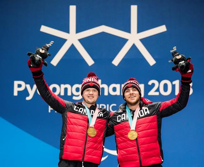 Mac Marcoux, guide Jack Leitch race to Canada's first gold of Paralympics | iNFOnews.ca