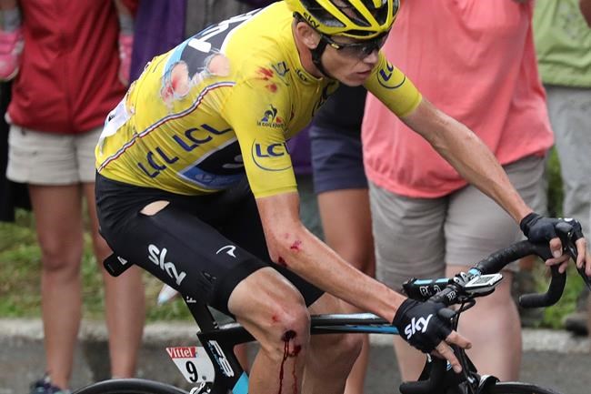 'Never a quiet day': Froome crashes but keeps yellow at Tour | iNFOnews.ca CP923340247