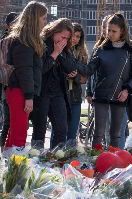 Mourners walk silently to honour Utrecht shooting victims | iNFOnews.ca
