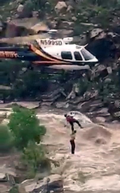 Rescuer clung to boy plucked from Arizona flash flood | iNFOnews.ca