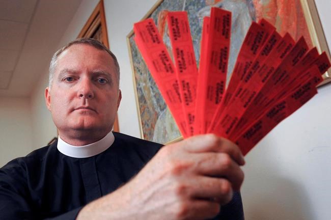 Pastor who won AR-15 rifle raffle won't be charged | iNFOnews.ca CP531070367