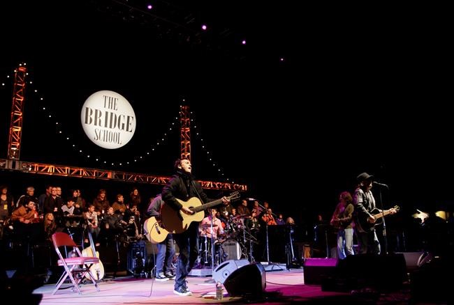 The Latest: Pearl Jam unapologetic for White House poster | iNFOnews.ca