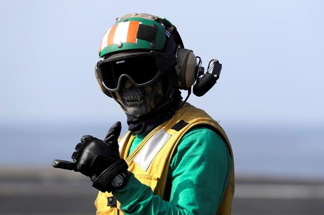 Planes launched off US carrier in Gulf pound IS militants | iNFOnews.ca