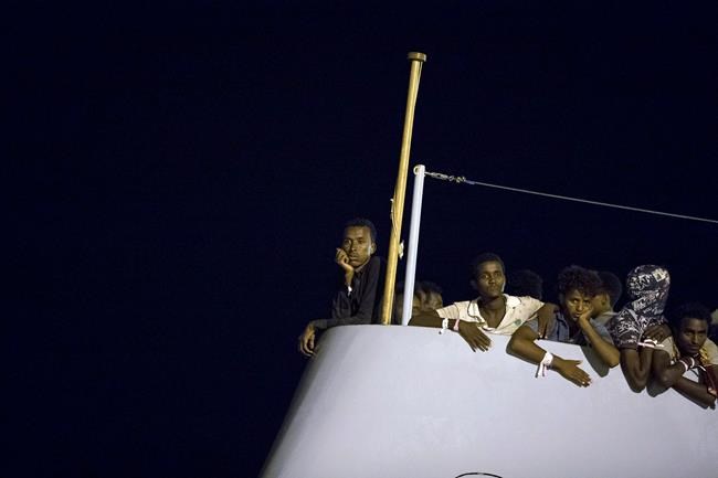 Migrants disembark in Sicily after EU sharing plan reached | iNFOnews.ca