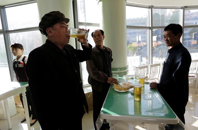 For tired Pyongyang workers, beer's on tap at stand-up bars | iNFOnews.ca