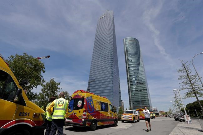 Hoax bomb scare prompts evacuation of 57-story Madrid tower | iNFOnews.ca Hoax bomb scare prompts evacuation of 57-story Madrid tower | iNFOnews.ca
