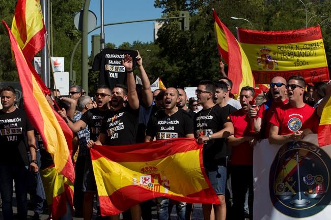 The Latest: Caixabank to switch HQ out of Catalonia | iNFOnews.ca