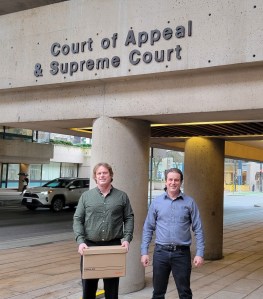 Brad and Darren Besler stand outside the BC Court of Appeal.