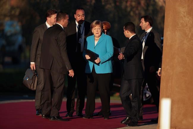 The Latest: German court rejects case against migration pact | iNFOnews.ca CP1862929555