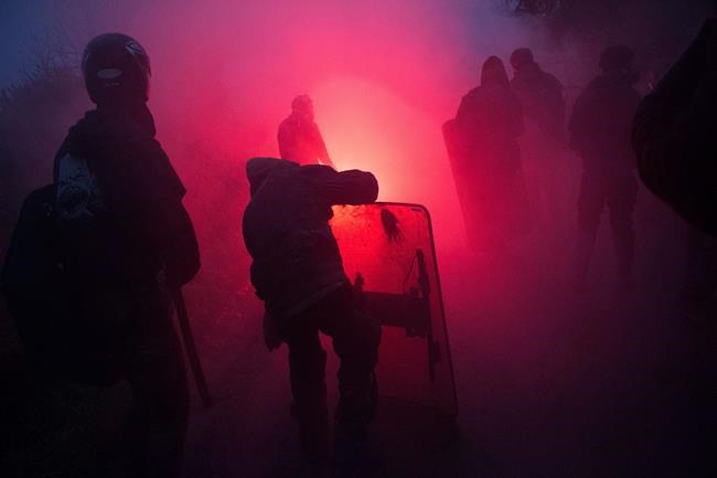 French activists clash again with police at protest camp | iNFOnews.ca