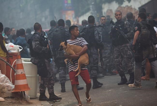Rio shootout kills 3, closes streets in Copacabana, Ipanema | iNFOnews.ca Rio shootout kills 3, closes streets in Copacabana, Ipanema | iNFOnews.ca