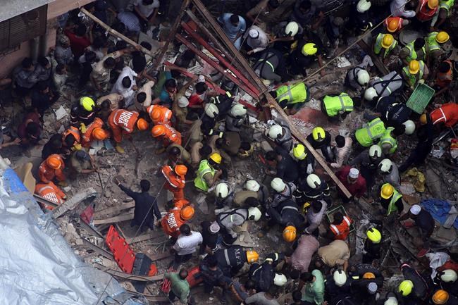 Rescuers find 14 bodies after building collapse in India | iNFOnews.ca