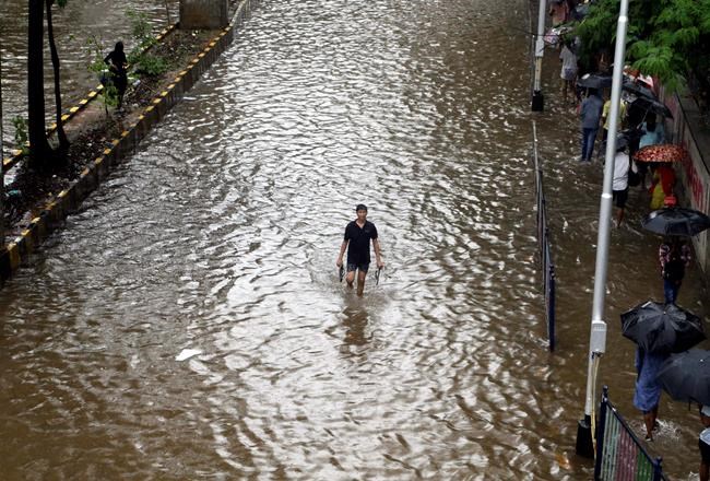 Indian dam overflows after heavy monsoon rains, 12 dead | iNFOnews.ca Indian dam overflows after heavy monsoon rains, 12 dead | iNFOnews.ca