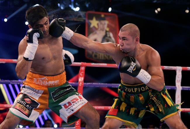 Indian boxer beats Chinese rival but doesn't want his belt | iNFOnews.ca