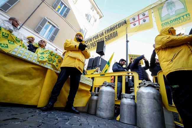 Sardinian shepherds pour milk on roads to protest low prices | iNFOnews.ca Sardinian shepherds pour milk on roads to protest low prices | iNFOnews.ca