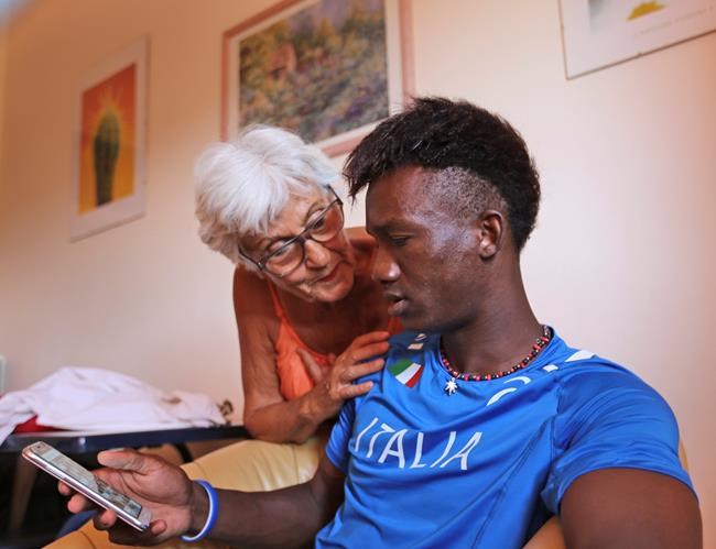 Opening door to migrants, some Italians defy government line | iNFOnews.ca Opening door to migrants, some Italians defy government line | iNFOnews.ca