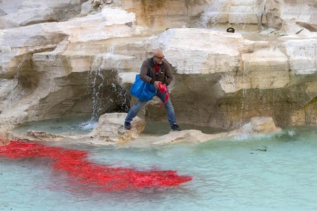 Activist-vandal dyes water of Rome's Trevi Fountain red | iNFOnews.ca Activist-vandal dyes water of Rome's Trevi Fountain red | iNFOnews.ca