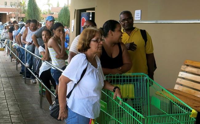 Puerto Rico emerges from storm; water and some food scarce | iNFOnews.ca