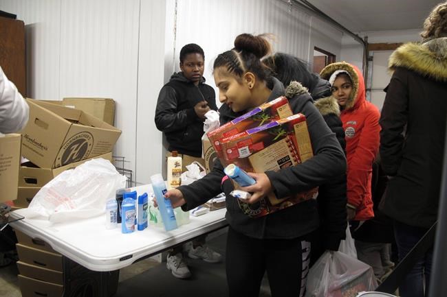 Refugees thank adoptive North Dakota city by feeding hungry | iNFOnews.ca Refugees thank adoptive North Dakota city by feeding hungry | iNFOnews.ca