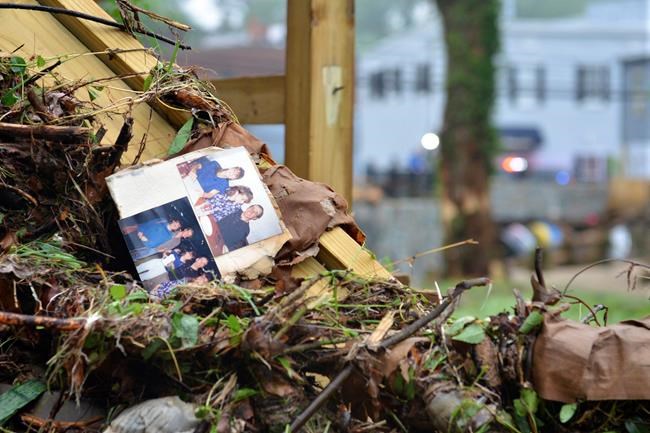 The Latest: Flooded business owners determined to rebuild | iNFOnews.ca