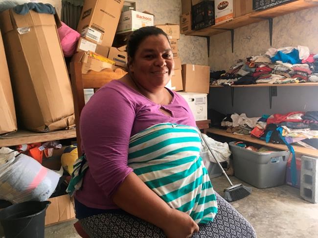 Asylum seekers bring evidence to show the dangers of home | iNFOnews.ca CP269480602