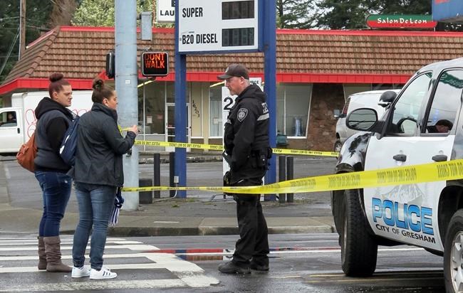 The Latest: 2 girls likely dead before police fired at dad | iNFOnews.ca