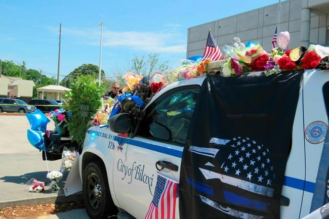 Slain police officer was shot from behind, investigator says | iNFOnews.ca