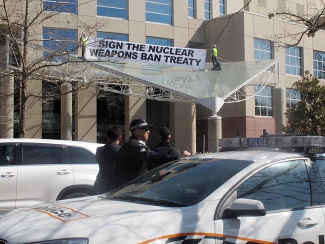 Anti-nuclear weapons protesters scale Australian building | iNFOnews.ca