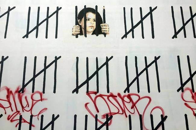 Vandal tags mural created by British graffiti artist Banksy | iNFOnews.ca