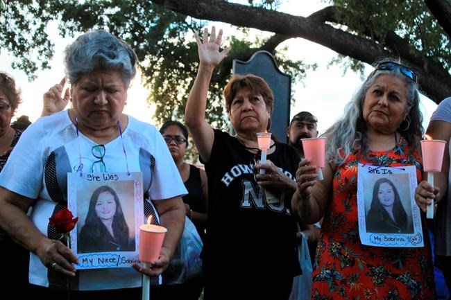 Relatives have vigil for 4 allegedly killed by border agent | iNFOnews.ca