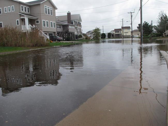 Amid rising seas, 'dry' resort is wetter than it likes | iNFOnews.ca