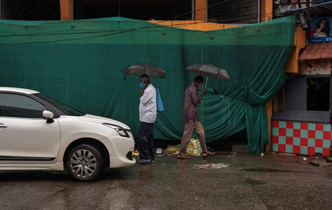 Monsoon flood, mudslide kill 15 in India, disaster team sent | iNFOnews.ca CP897237416
