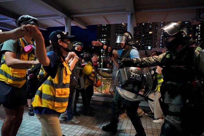 The Latest: Hong Kong protesters block roads near airport | iNFOnews.ca The Latest: Hong Kong protesters block roads near airport | iNFOnews.ca